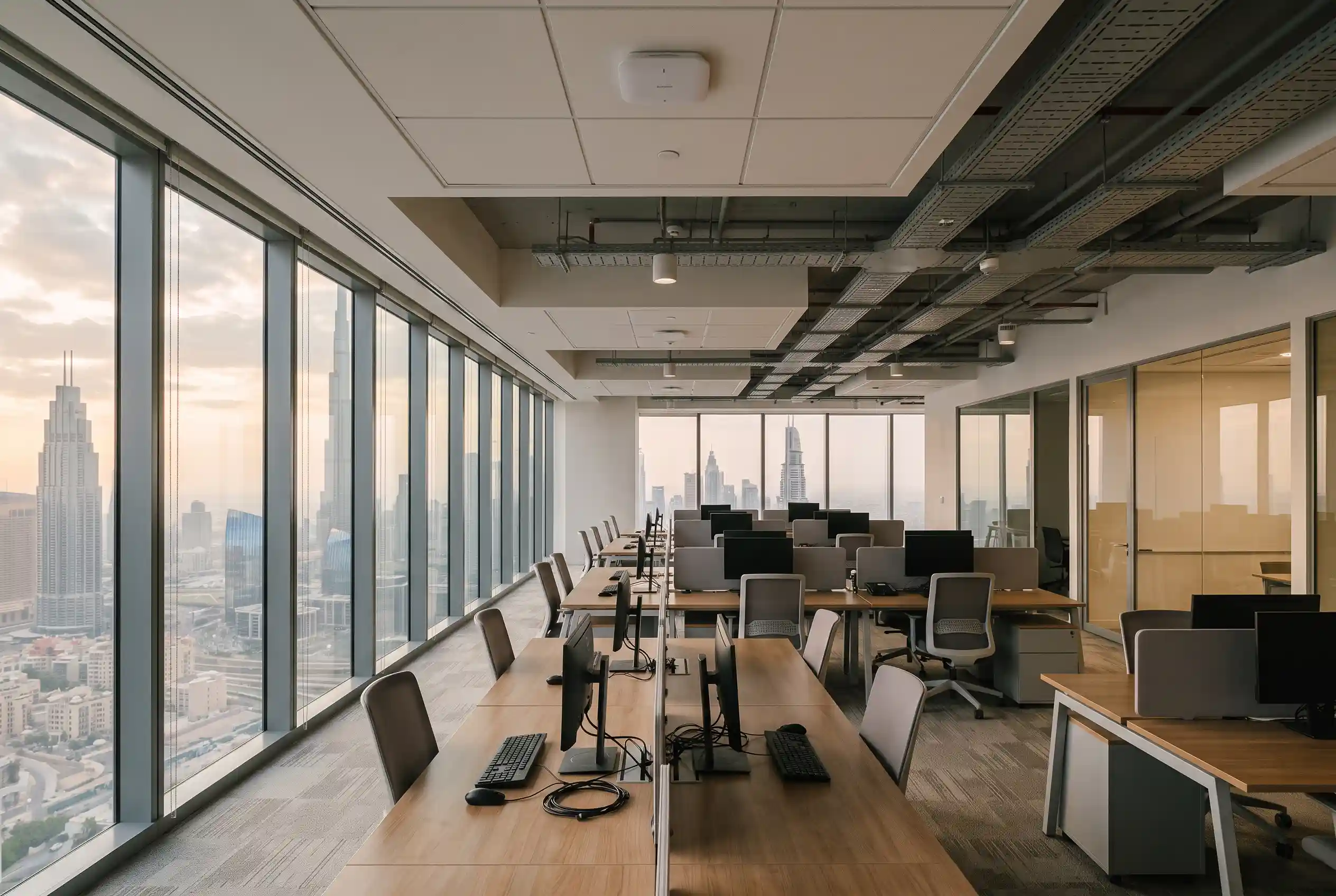 Corporate office floor in the UAE with structured cabling and ceiling-mounted wireless access points