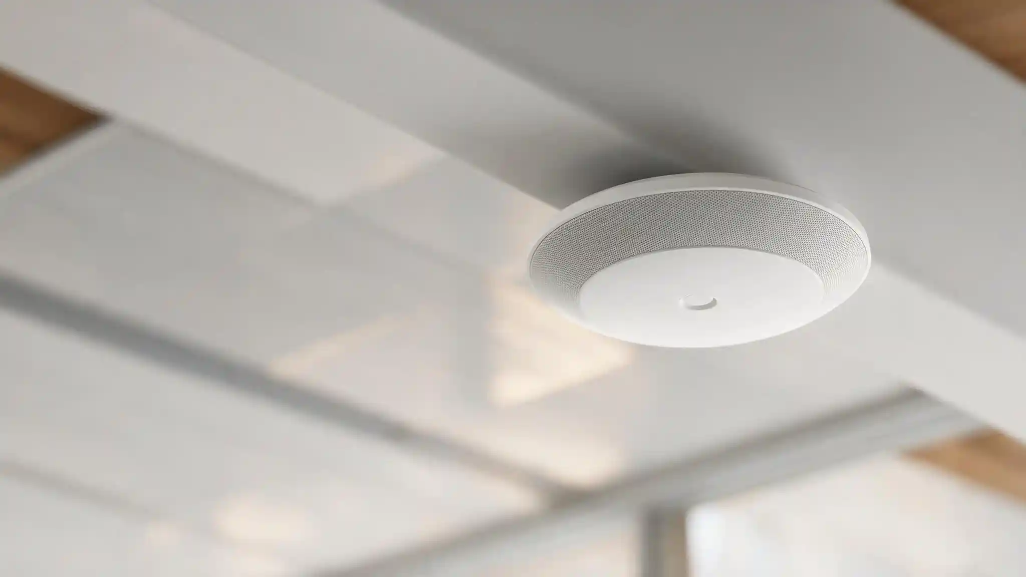 Wi-Fi 8 explained for UAE businesses — enterprise access point in a modern office ceiling
